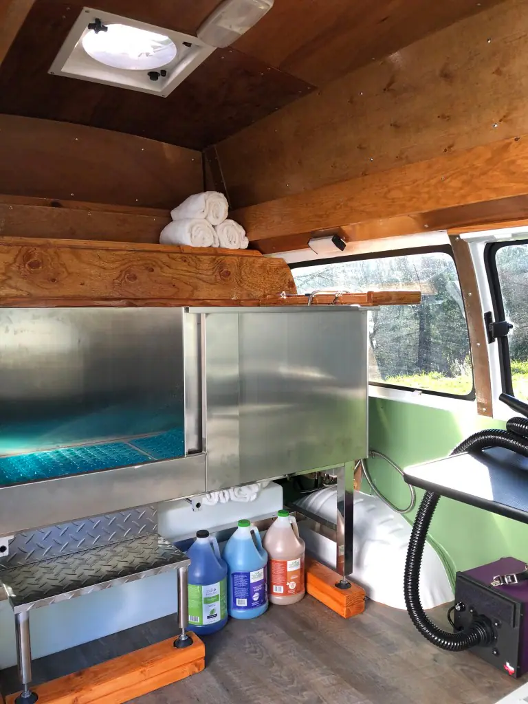 Olympic Mobile Dog Grooming van setup and grooming workspace